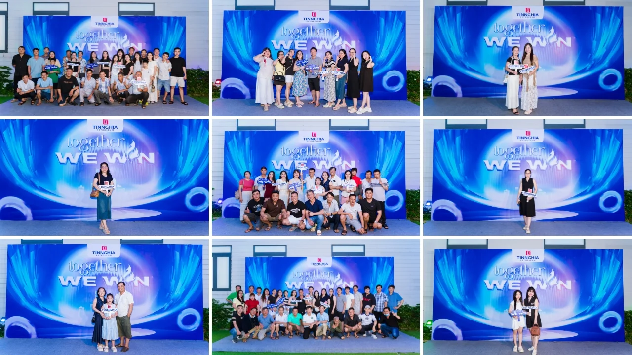 Thành viên check-in rạng rỡ tại backdrop Gala Dinner